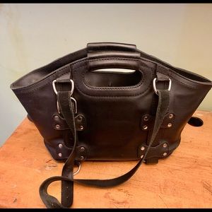 Saddleback full- grain leather tote in black.